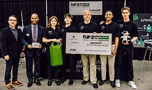 Photo of WWU Enactus team holding first place banner