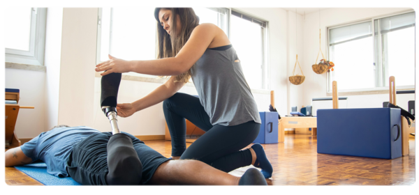 Physical therapist working with a client